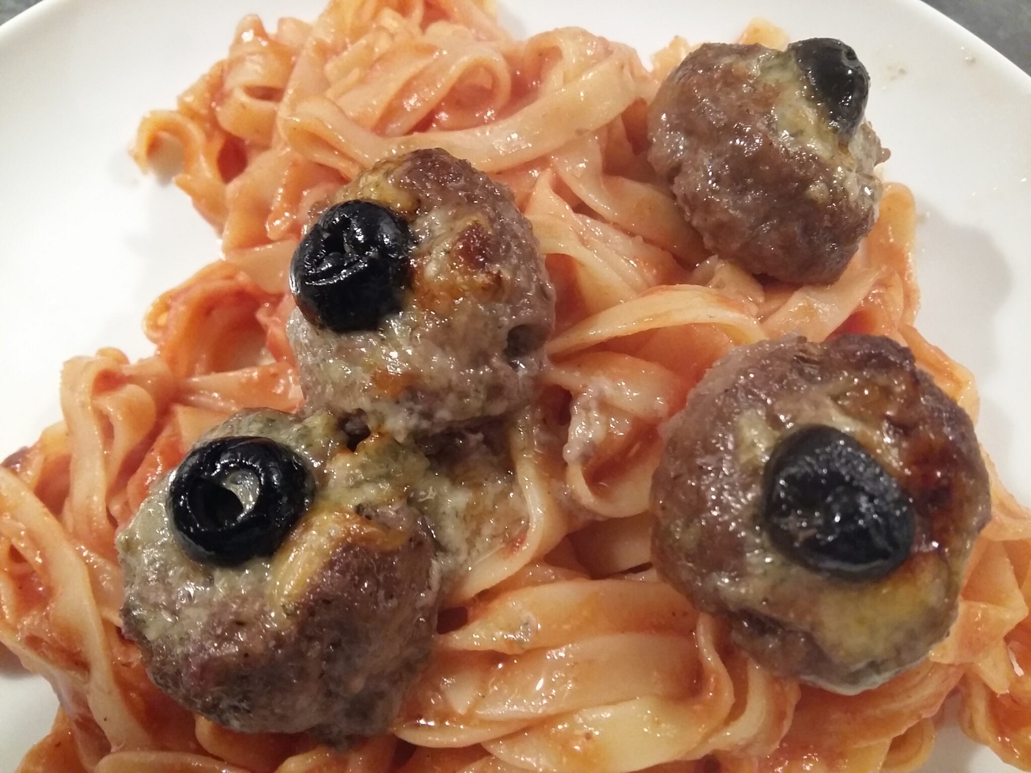 Eyebal meatballs and bloody tapeworms